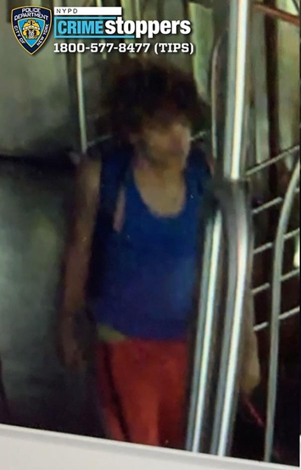 The male suspect was wearing a blue tank top. 